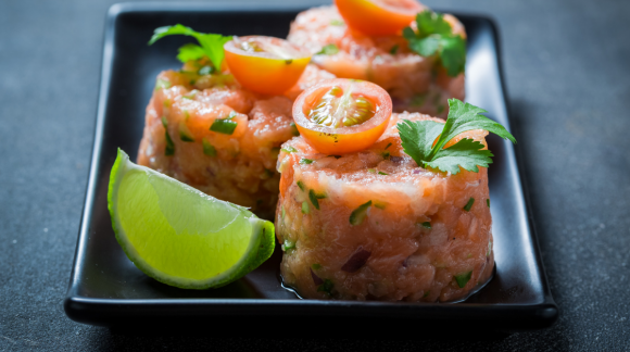 Tartare with two types of salmon, walnut oil and flax seeds