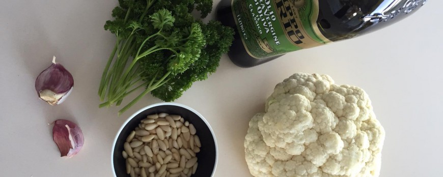 Cauliflower couscous and pine nuts